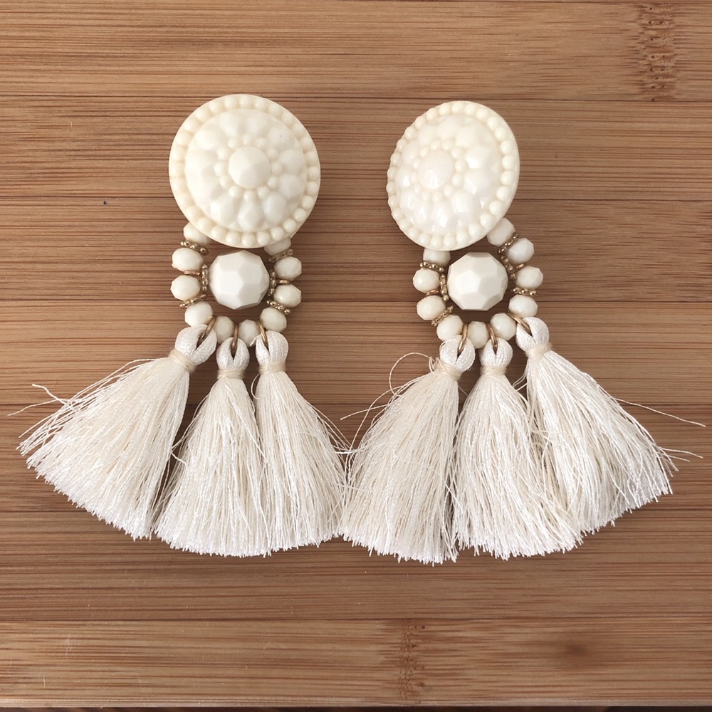 White tassle earrings